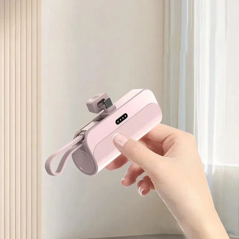 Compact 10000 mAh Fast Charging Power Bank with Built-in Cable for iPhone and Xiaomi